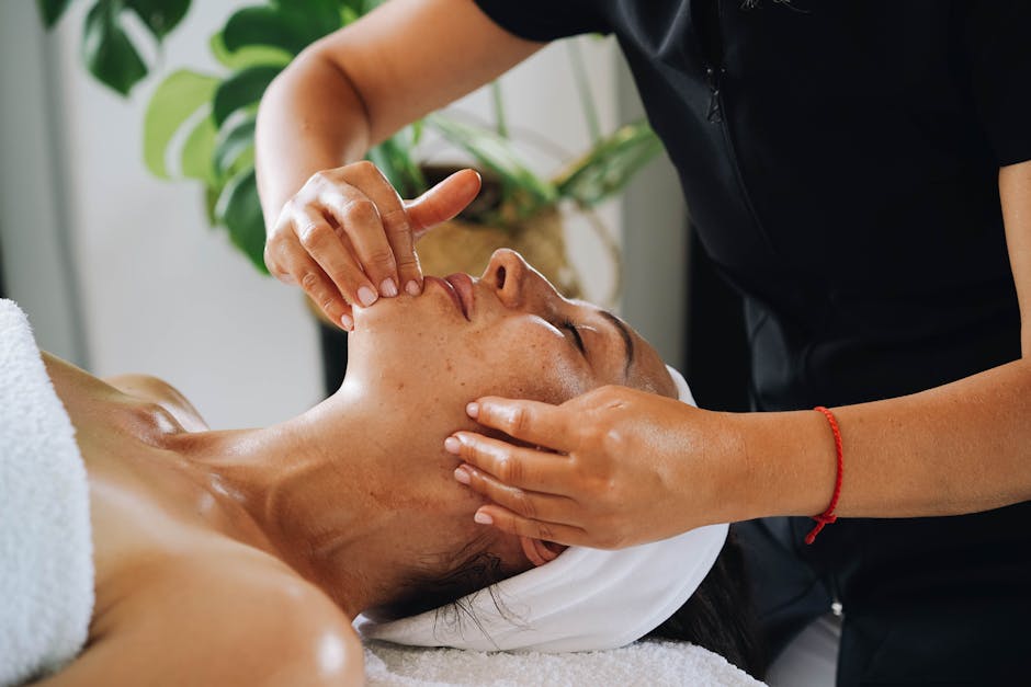 Skilled therapist performing traditional head massage technique in Nashik