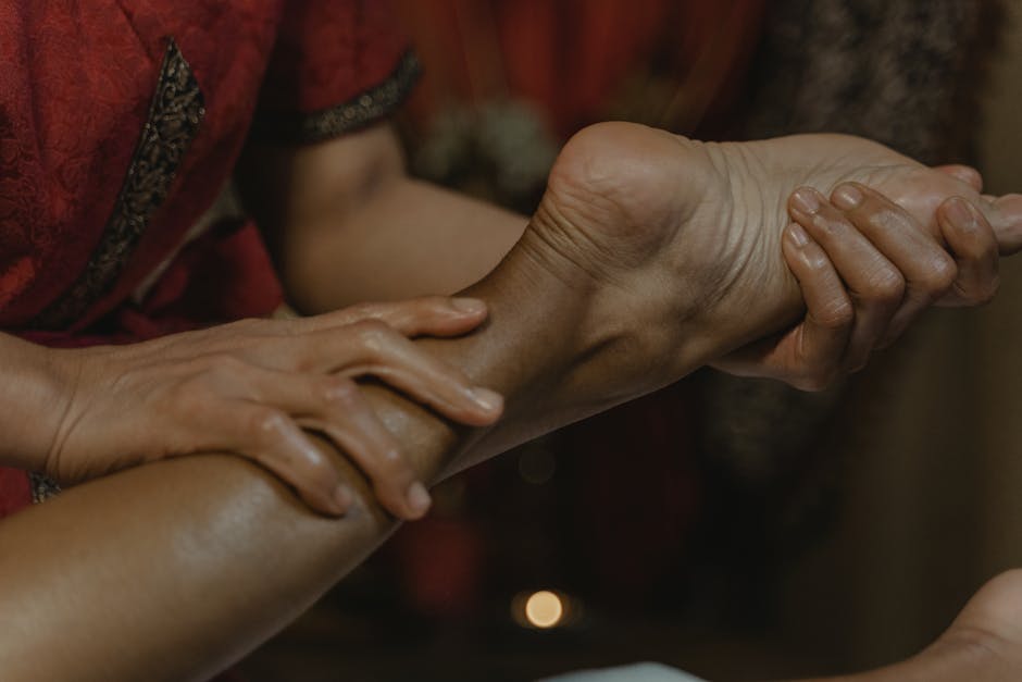 Relaxing reflexology foot massage session in modern Nashik spa environment